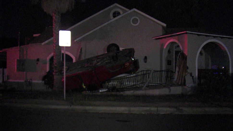 Driver who crashed into house suspected of DWI. (Courtesy: Ken Branca)