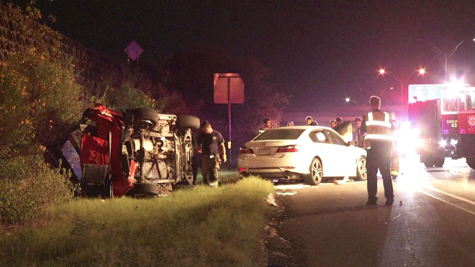 People trapped in truck after fiery rollover crash