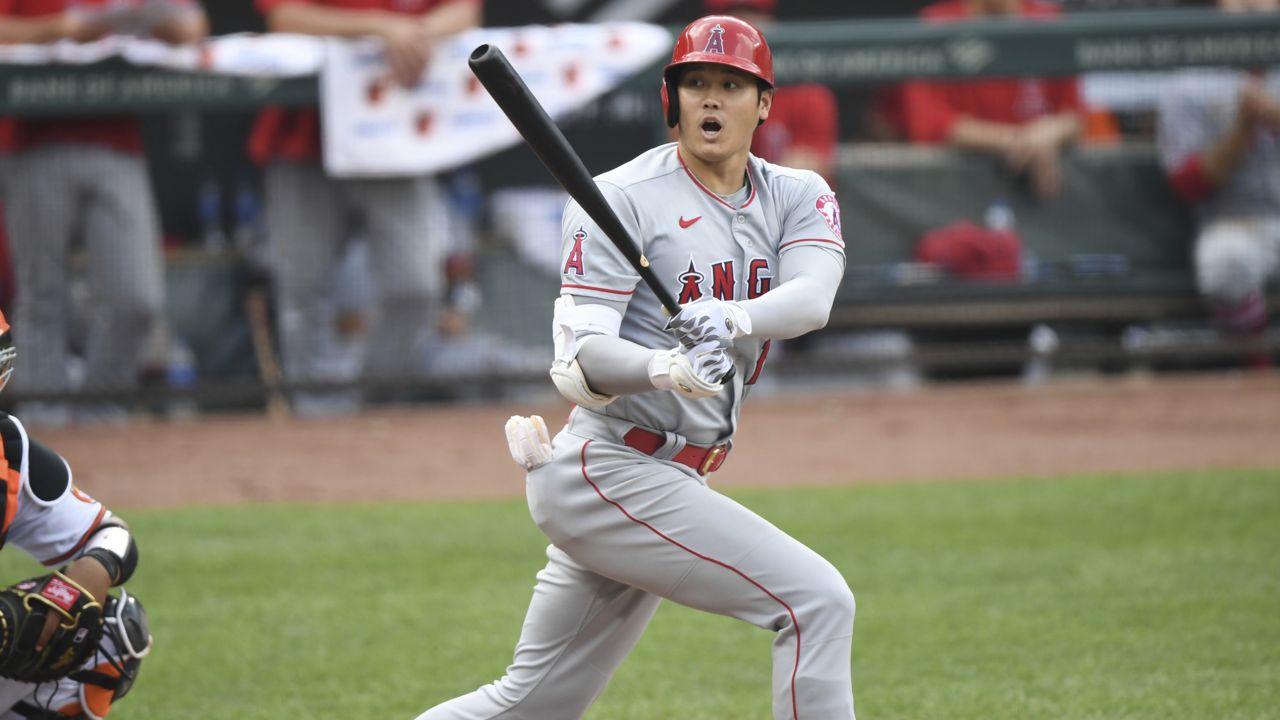 Los Angeles Angels' Shohei Ohtani reacts after hitting a foul ball in the eighth inning a baseball game against Baltimore Orioles, Thursday, Aug. 26, 2021, in Baltimore. (AP Photo/Terrance Williams)