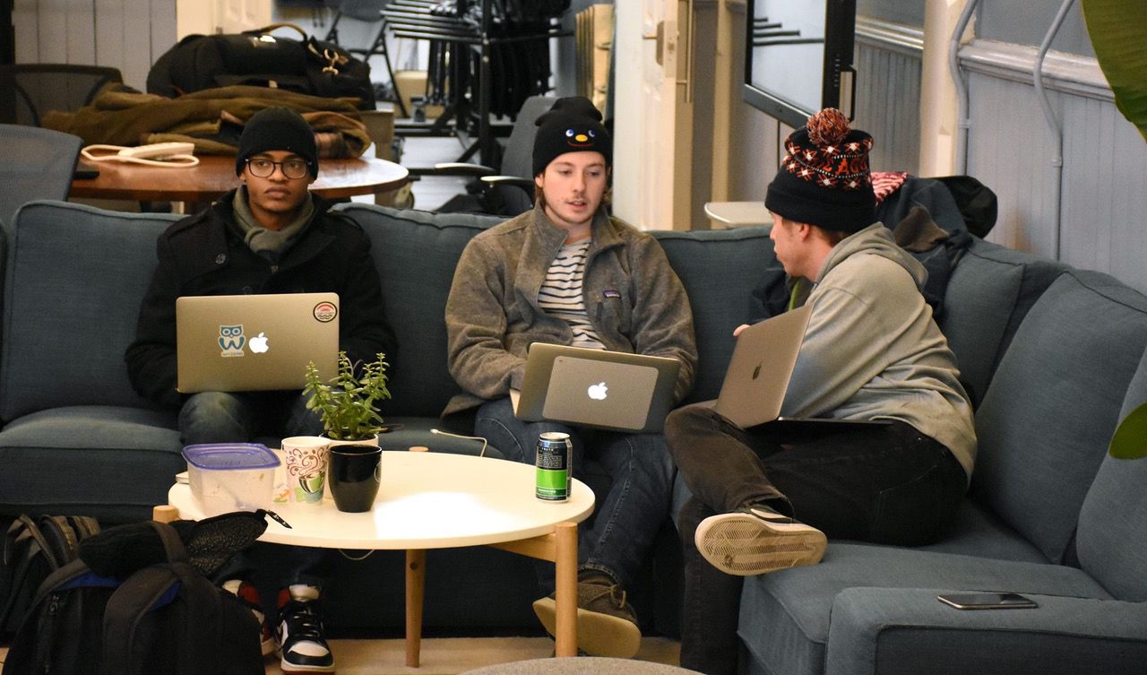 Young tech developers sit on a couch at Union Hall in Cincinnati in 2018. (Spectrum News 1/Casey Weldon)