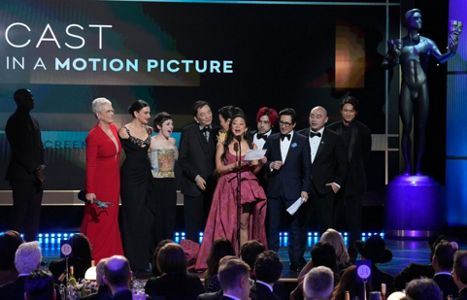 Aubrey Plaza, from right, and Jenna Ortega present Sam Elliott with the  award for outstanding performance by a male actor in a television movie or  limited series for 1883 at the 29th