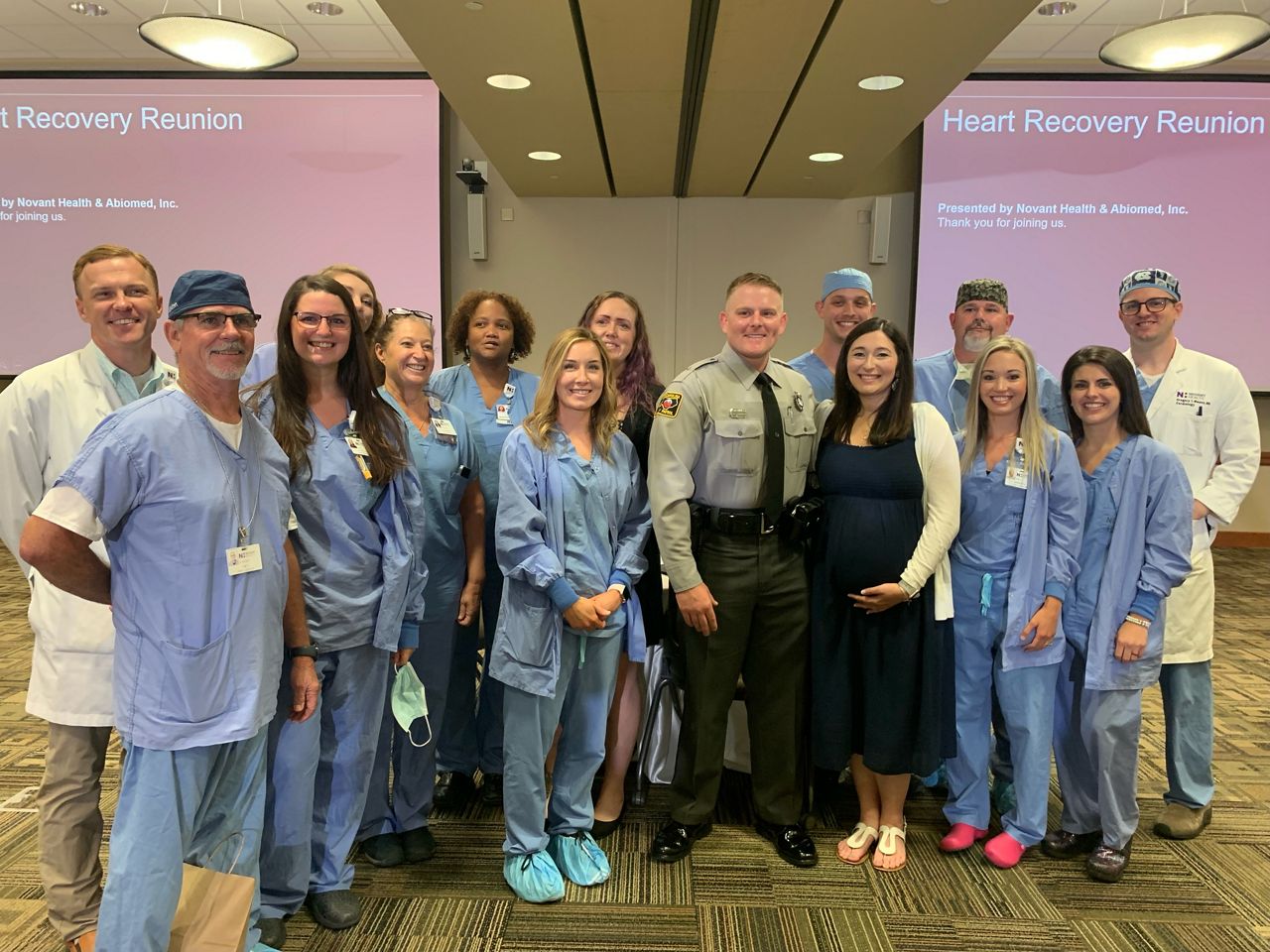 Ethan and Mickaela Bradshaw with some of the medical staff who helped save his life. (Mickaela Bradshaw)