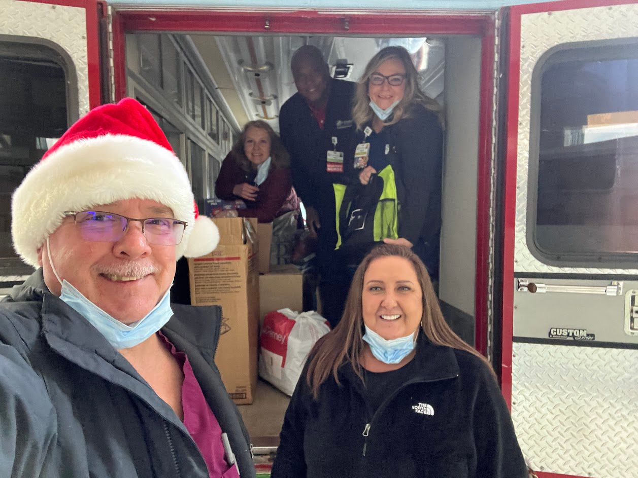 A group of holiday volunteers for the Emergency Shelter of Northern Kentucky. The shelter, and others like it, rely on volunteers during the holiday and all year round. (Photo courtesy of Emergency Shelter of Northern Kentucky)