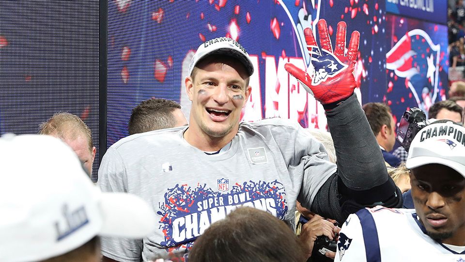 Tom Brady takes batting practice with Rob Gronkowski