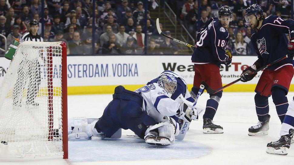 Tampa Bay Lightning goaltender Andrei Vasilevskiy gives up a goal in a 3-1 Game 3 loss to Columbus.  The Lightning are on the verge of becoming the first-ever Presidents' Trophy winner to be swept in the first round of the NHL Playoffs.  (AP Photo/Jay LaPrete)