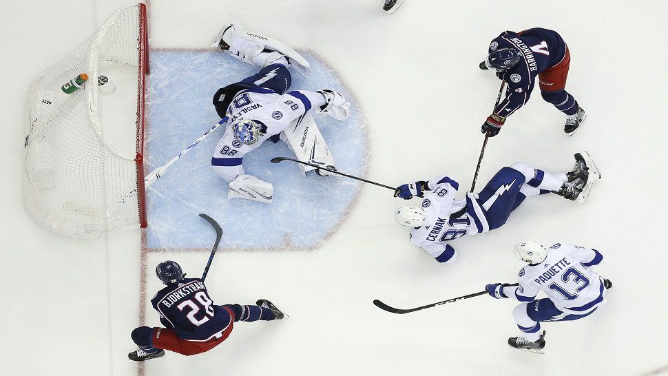 Columbus Blue Jackets forward Oliver Bjorkstrand scores in the second period of Game 4, a 7-3 Columbus victory over the Tampa Bay Lightning.  Tampa Bay was outscored in the series 19-8.  (AP Photo/Jay LaPrete)