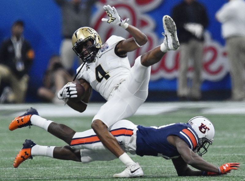 UCF's Tre'Quan Smith (#4) was selected 91st overall by the New Orleans Saints in the third round of the NFL Draft.  Teammate Jordan Akins was chosen just seven picks later by the Houston Texans. (AP PHOTO)