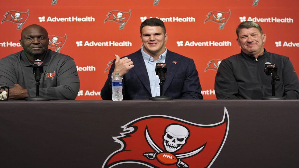 2024 Tampa Bay Buccaneers first round draft pick Graham Barton, center, speaks to the media as he sits with head coach Todd Bowles, left, and general manger Jason Licht, right, during an NFL football news conference Friday, April 26, 2024, in Tampa, Fla. Barton played his college football at Duke. (AP Photo/Chris O'Meara)