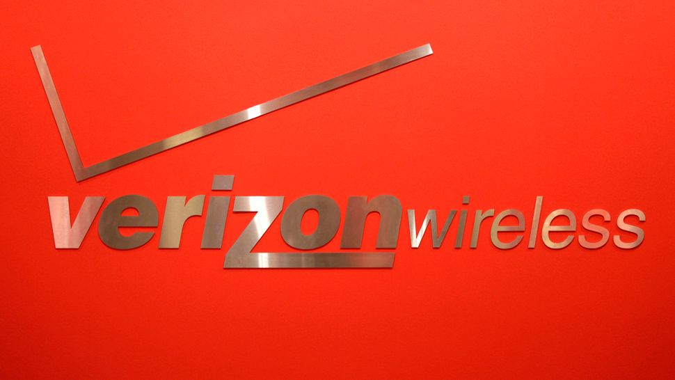 FILE - This Feb. 10, 2011, file photo, shows a Verizon Wireless logo at one of its stores in New York. (AP Photo/Seth Wenig, File)