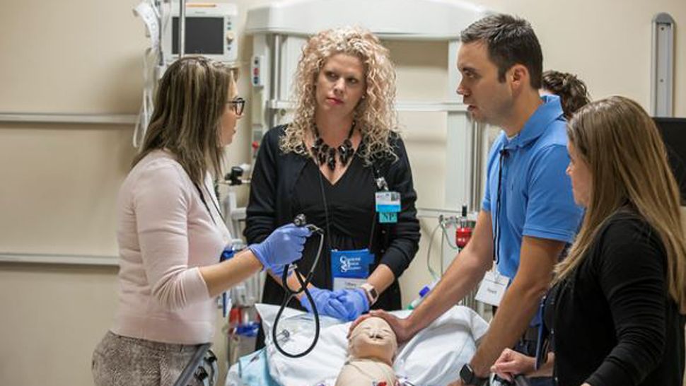 Educators from the Harvard University's Center for Medical Simulation work with staff at Johns Hopkins All Children's Hospital during an intensive, hands-on training program focused on patient safety. (Photo courtesy Johns Hopkins All Children's Hospital)