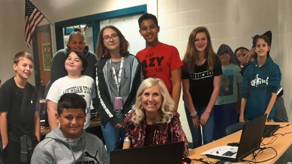 Susan Terry (center) and her seventh grade class at Carwise Middle School in Palm Harbor. Student Diego Jose Mercado Rivera (front left) wrote about Terry in an essay for a Barnes and Noble writing contest and won, earning Terry the title 'My Favorite Teacher.' (Photo courtesy Susan Terry)