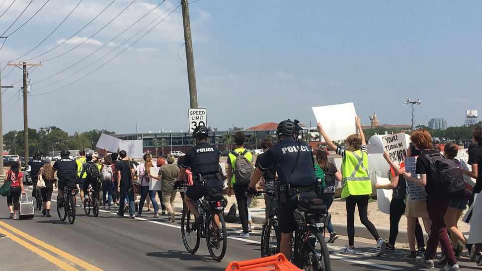 Students from Blake High School in Tampa marched for gun safety, Friday, April 20, 2018. The march was planned to coincide with the National School Walkout - students marched after finishing classes for the day. (Dalia Dangerfield, staff)