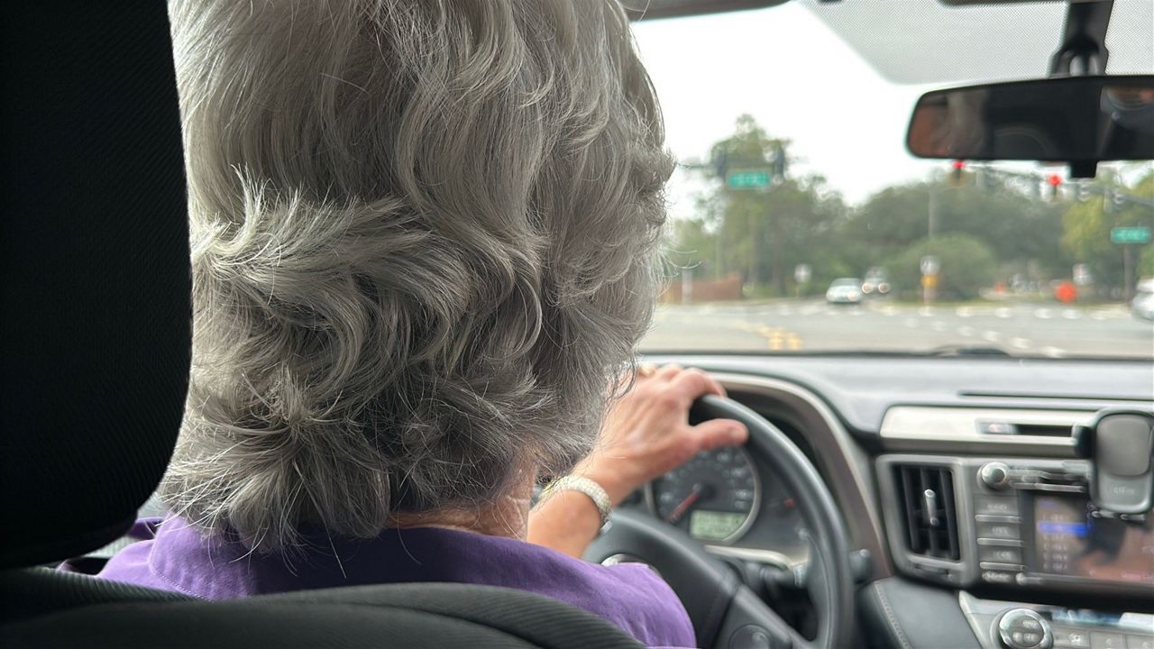 Jan Delaney says when she tries to cross SR-436 at Kewannee Trail, drivers coming from the opposite direction won’t yield to her. (Jerry Hume, Spectrum News)