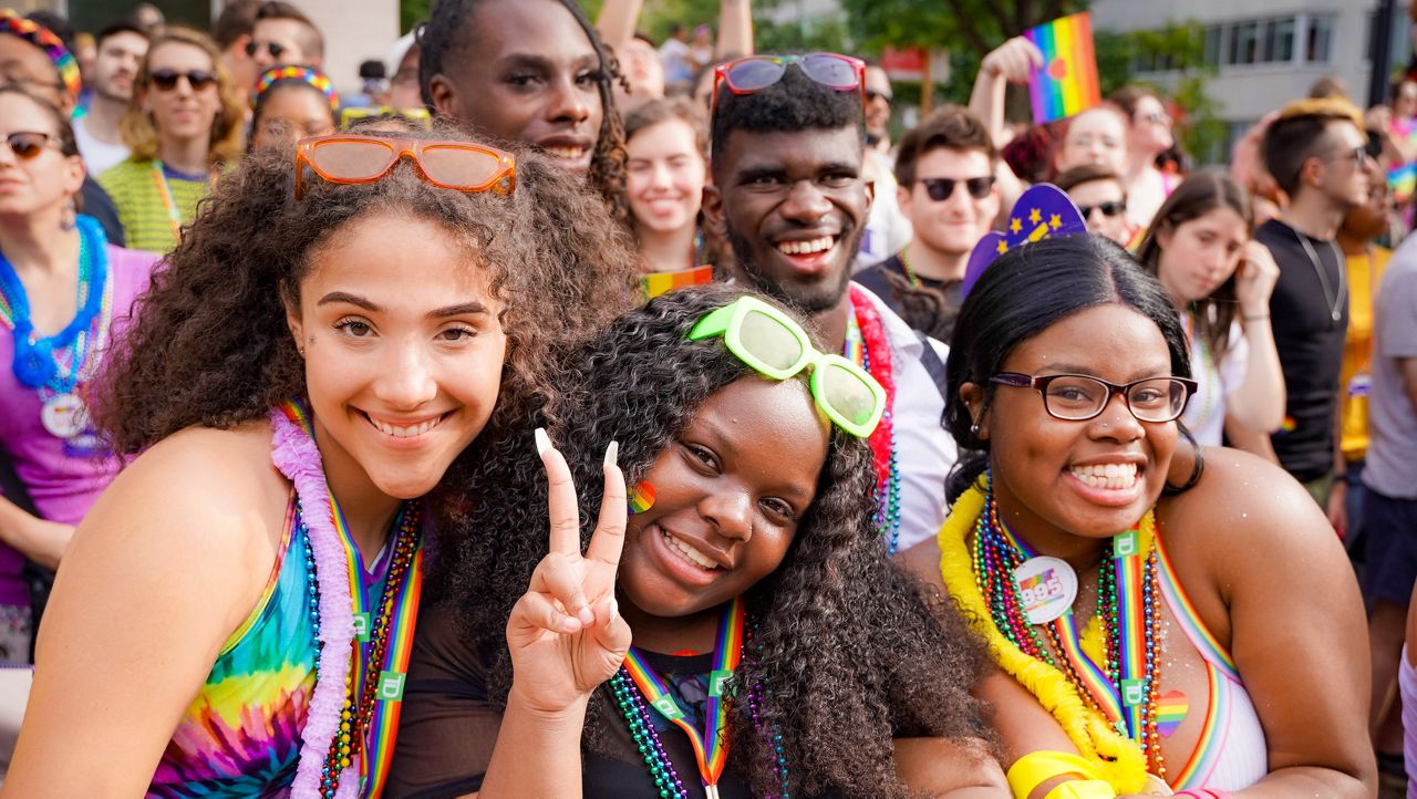 A group of attendees celebrate at the 2024 DC pride parade (photo courtesy of Capital Pride Alliance)