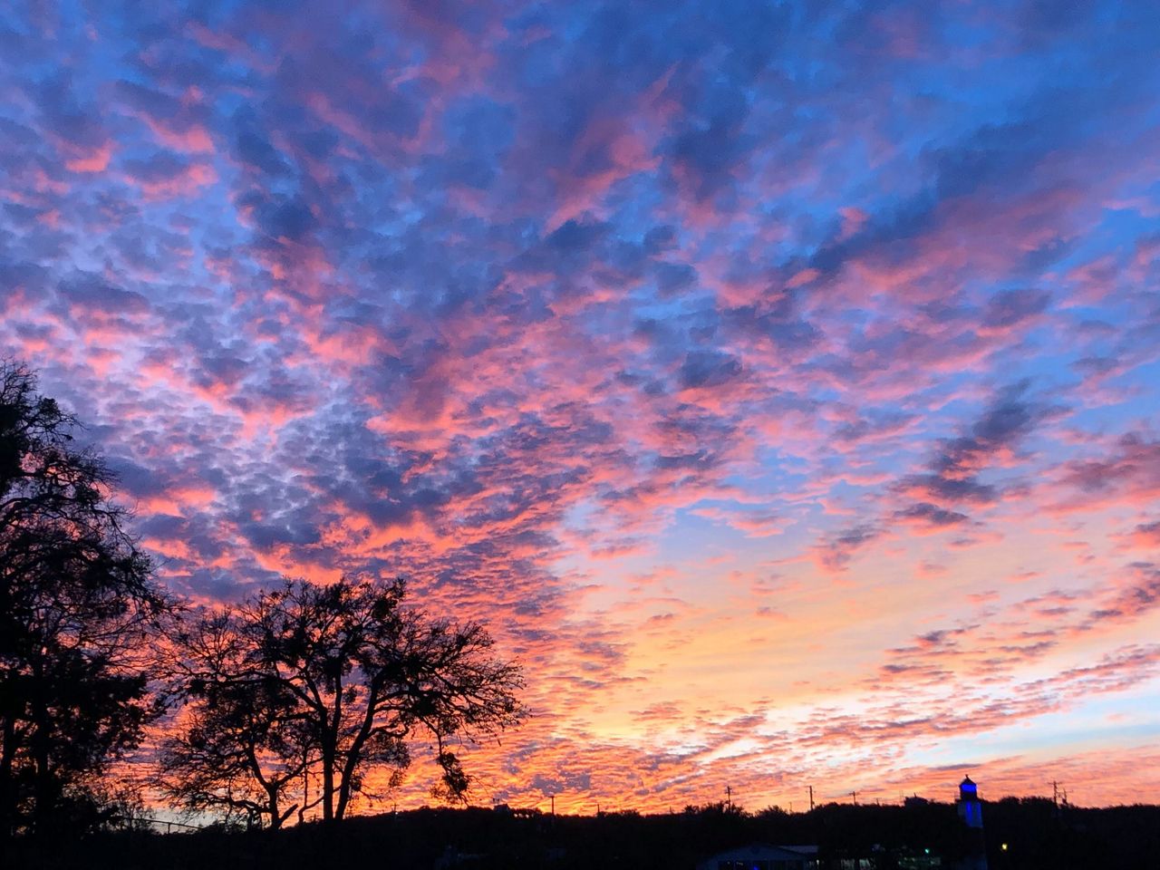 Sunset views over Lake Travis in Briarcliff. 