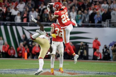 Kansas City Chiefs strong safety Tyrann Mathieu (32) runs off the field at  halftime of the NFL Super Bowl 54 football game between the San Francisco  49ers and Kansas City Chiefs Sunday