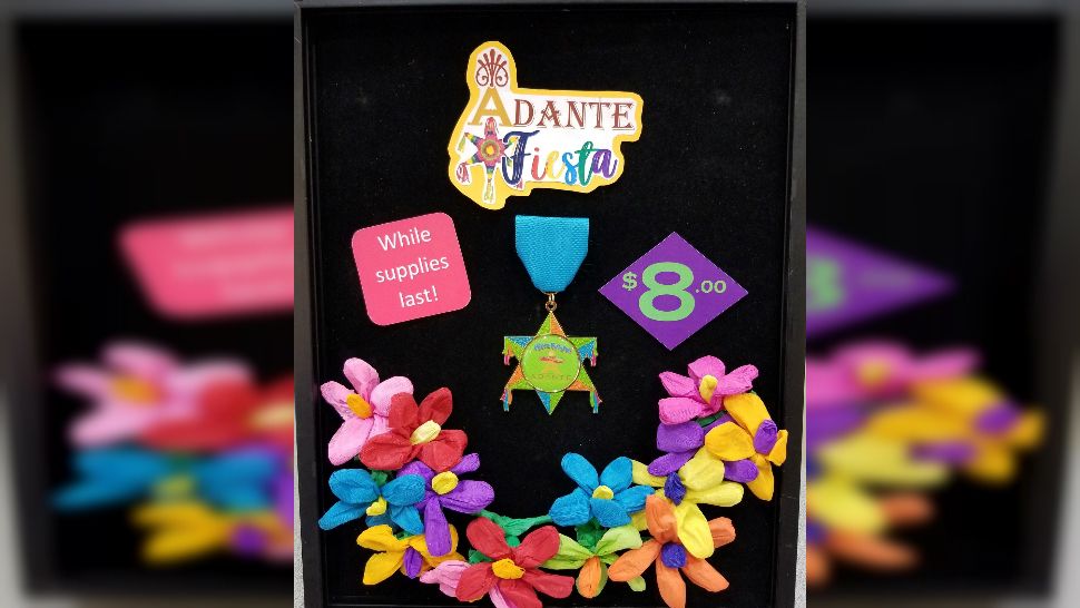 A picture of the Adante Fiesta Medal surrounded by flowers. (Picture courtesy: Adante Senior Living facility)