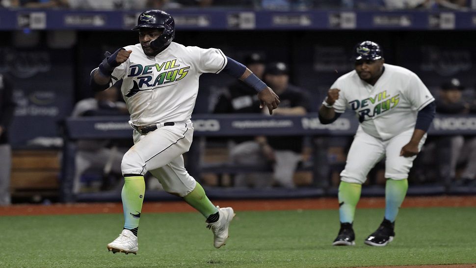 Tampa Bay Rays outfielder Guillermo Heredia rounds third base and would score on Ji-Man Choi's single in the sixth inning of Tampa Bay's 7-2 win over the Yankees.  (AP Photo/Chris O'Meara)