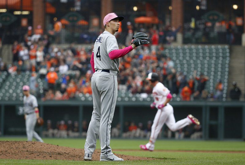 Blake Snell waits for a new ball after a home run by Trey Mancini (Winter Haven HS graduate) in Baltimore's 17-1 win over Tampa Bay. (AP Photo/Patrick Semansky)