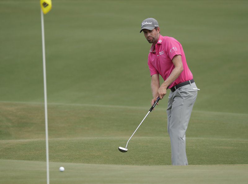 Webb Simpson watches his putt on the 8th green of The Players Championship at TPC Sawgrass.  Simpson recorded his biggest win since the 2012 U.S. Open, finishing 18-under, four strokes better than second place. (AP Photo/John Raoux)