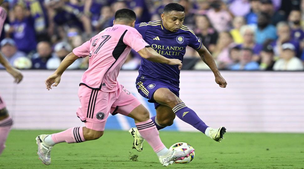 Orlando City forward Luis Muriel, right, controls the ball in front of Inter Miami defender Marcelo Weigandt (57) during the first half of an MLS soccer match Wednesday, May 15, 2024, in Orlando, Fla. (AP Photo/Phelan M. Ebenhack)