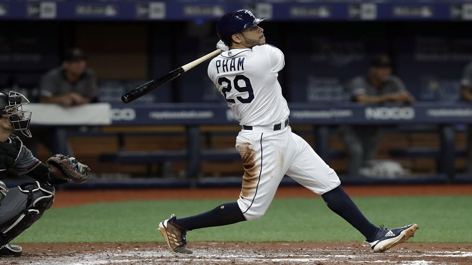 Tampa Bay Rays outfielder Tommy Pham watches his grand slam go over the center field fence during the second inning of the Rays' 12-1 win over Arizona.  (AP Photo/Chris O'Meara)