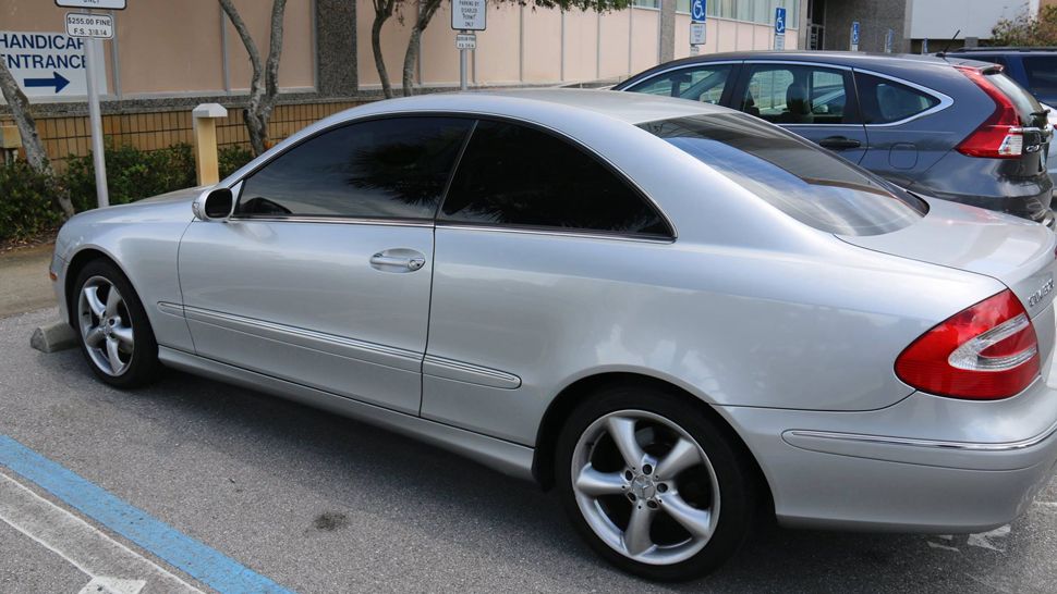 Clearwater Police arrested Dean Baaj, 51, and charged him with child neglect after he left his daughter locked in his 2004 Mercedes (pictured) outside the Pinellas County Courthouse while he attended a hearing. (Photo courtesy Clearwater Police)