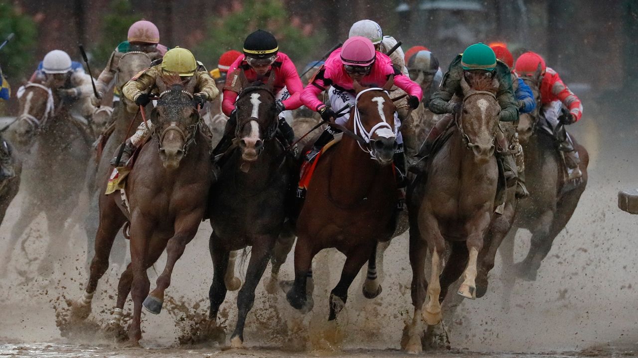 Luis Saez rides Maximum Security, second from right, and goes around turn four with Flavien Prat riding Country House, left, Tyler Gaffalione, who rode White Abarrio to victory at the Florida Derby, rides War of Will and John Velazquez rides Code of Honor, right, during the 145th running of the Kentucky Derby horse race at Churchill Downs Saturday, May 4, 2019, in Louisville, Ky. (AP Photo/John Minchillo)