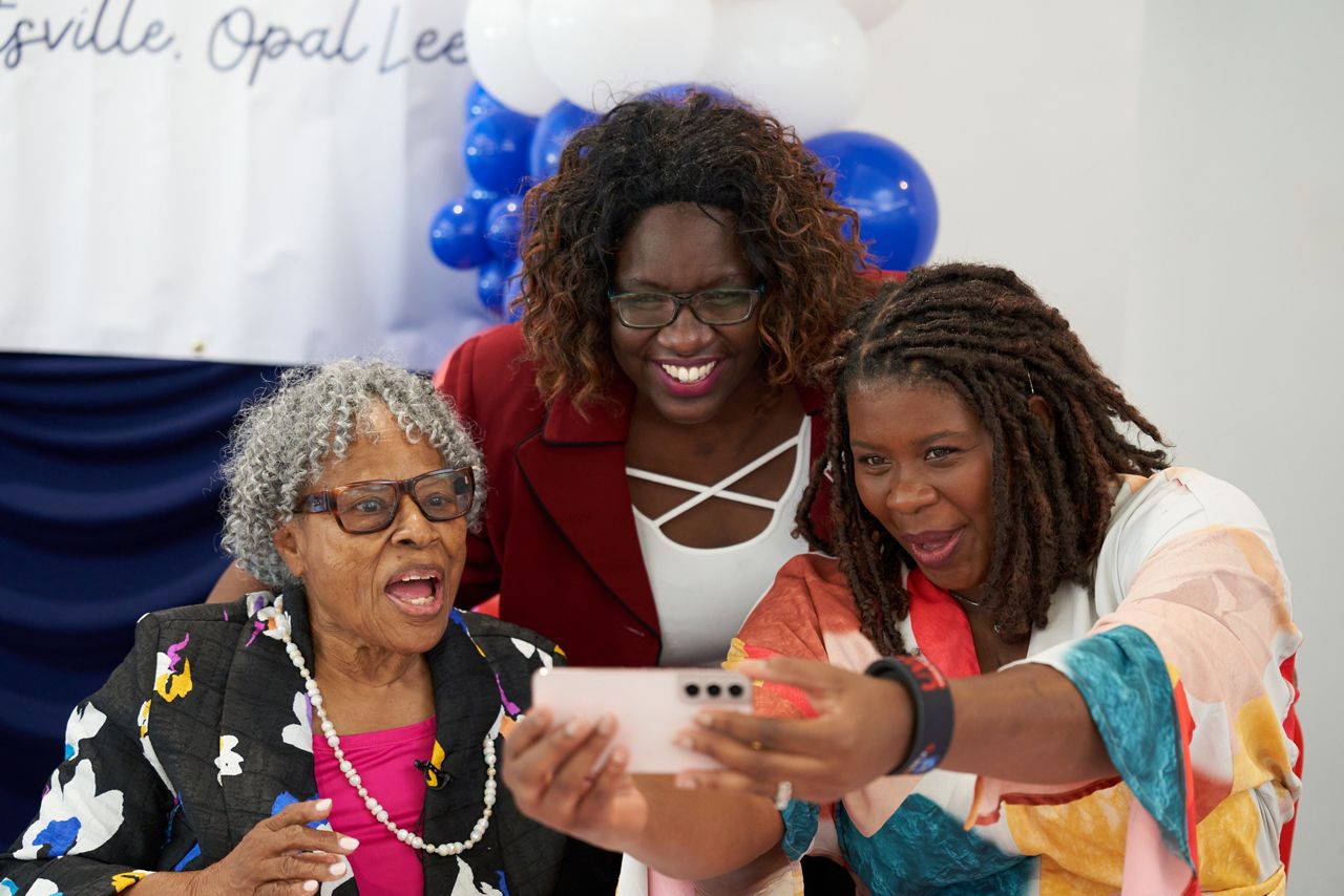 Opal Lee smiles for a picture with Violet Edwards and Angela Curry. In 2020 Edwards became the first black woman to serve as a commissioner in Alabama’s Madison County. Curry founded and executively directs the Huntsville based non-profit organization United Women of Color. (Credit, James D. Teed)