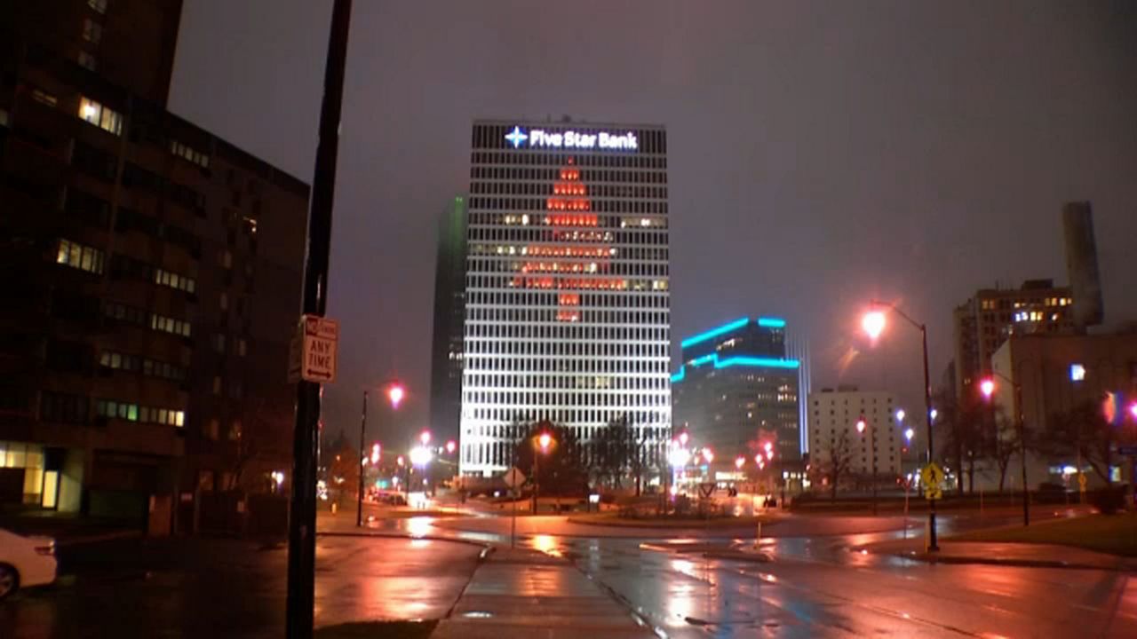 Downtown Rochester High Rise Lights Up Holiday Spirits in Time of Darkness