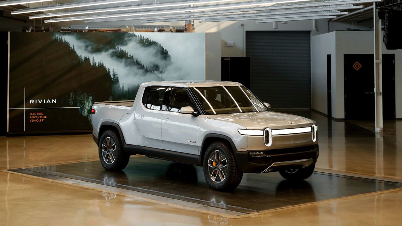 Rivian R1T electric pickup truck (AP Photo/Paul Sancya)