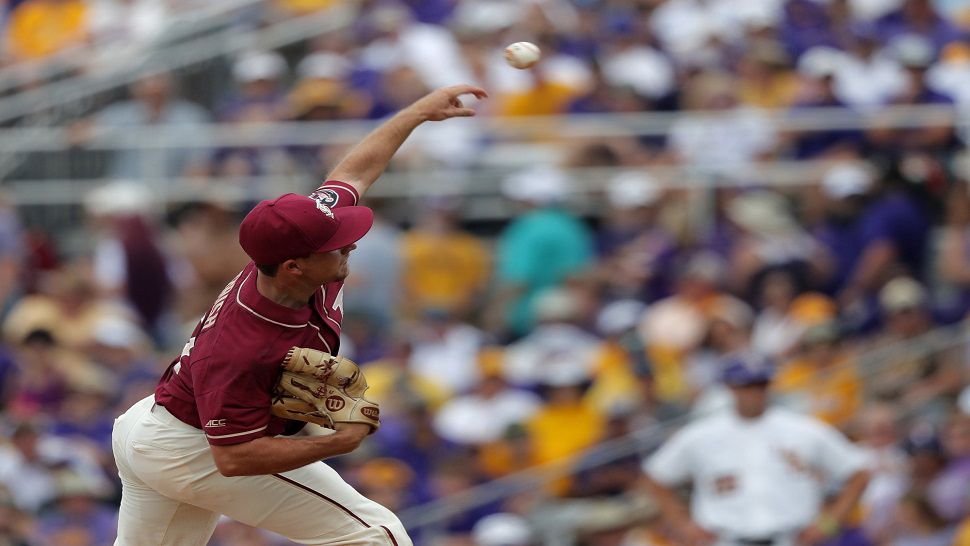 Florida State's Drew Parrish pitches in the first inning of the Baton Rouge Super Regional.  Two home runs from Reese Albert helped the Seminoles to a 6-4 win and a 1-0 lead in the series.  (AP Photo/Gerald Herbert)