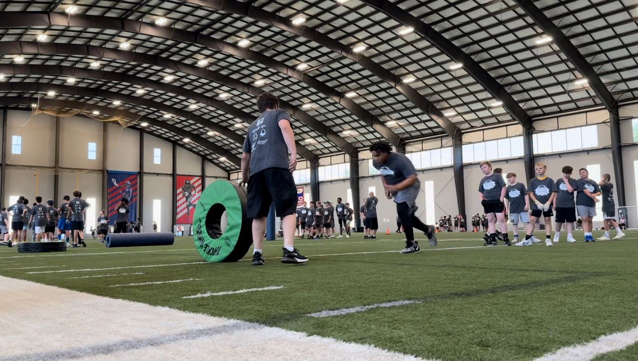 Football camps with NFL players are heating up