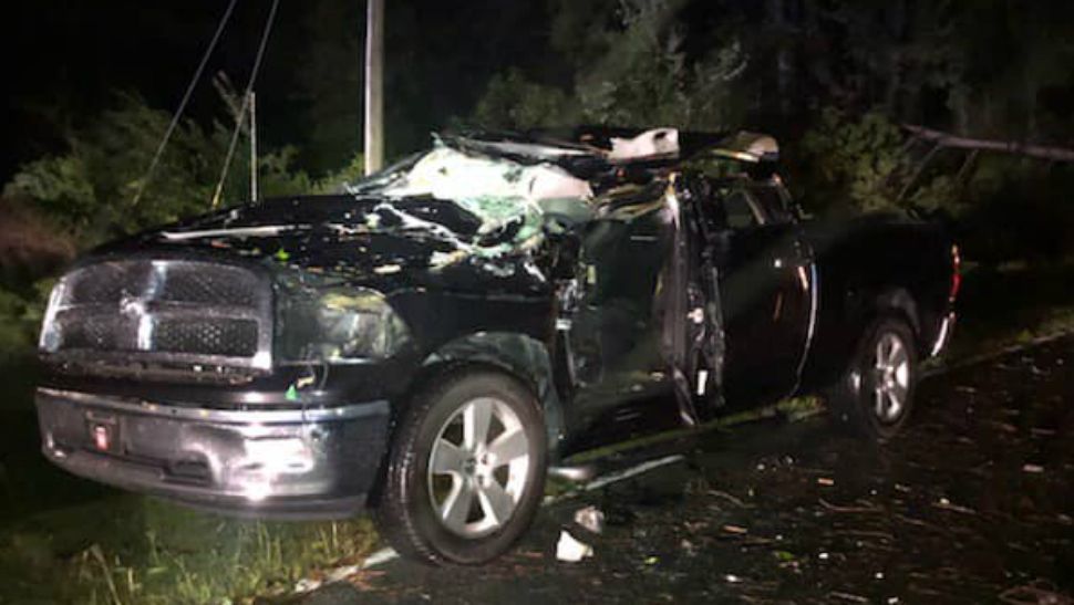 A pickup truck is crushed after being struck by a tree in Robeson County, North Carolina, in this image from September 5, 2019. (Source: Northwood's Fire and Rescue/Facebook)