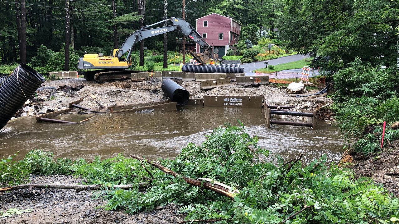 Heavy rains cause bridge collapse in Lenox