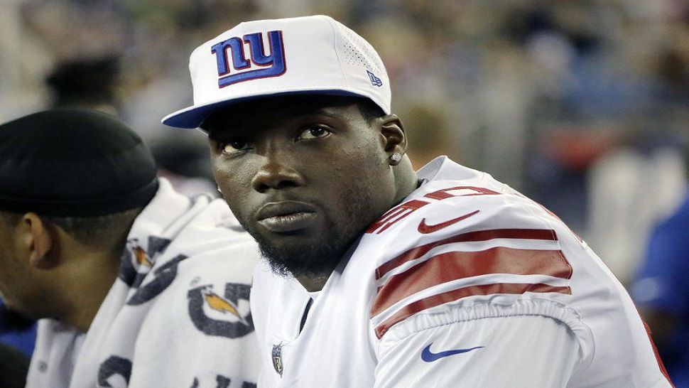 File photo of Jason Pierre-Paul when he was with the New York Giants.  Pierre-Paul won a Super Bowl in 2011 with the Giants.  (AP File Photo)