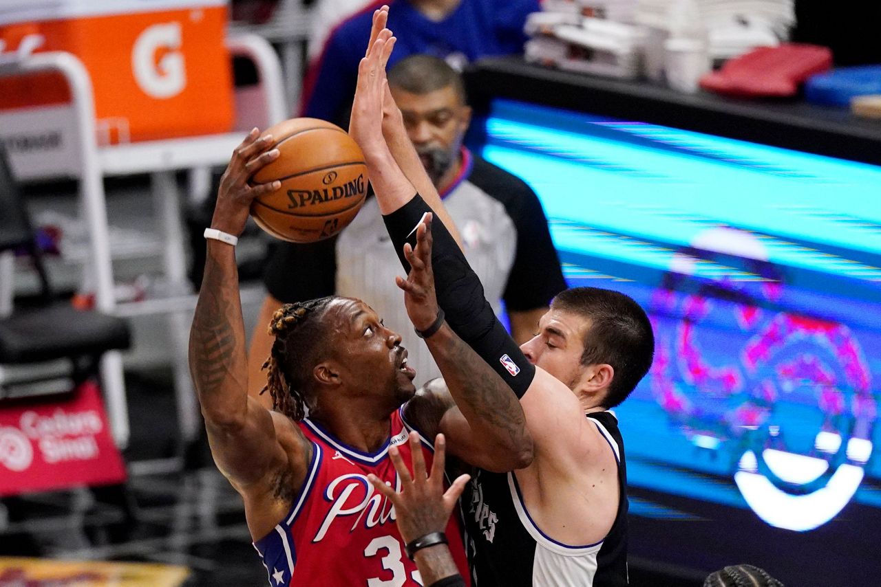 Leonard leads Clippers past 76ers in Rivers' first game back