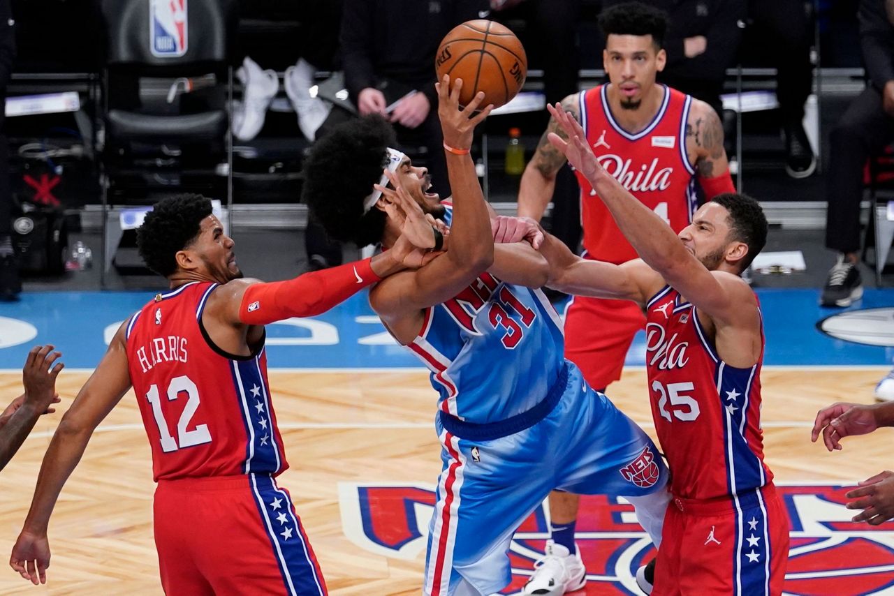 Nets, without Irving and Durant, beat NBAleading 76ers