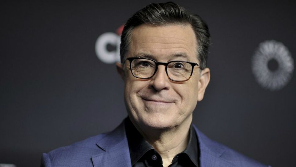 FILE - In this March 16, 2019, file photo, Stephen Colbert attends the 36th Annual PaleyFest "An Evening with Stephen Colbert" at the Dolby Theatre on Saturday, March 16, 2019, in Los Angeles. Now Prime Minister Jacinda Ardern may have found the perfect spokesman to embrace all of the above and more: American comedian Stephen Colbert. In an interview with The Associated Press on Thursday, Dec. 5, she talked about the boost to the country’s vital tourism industry that Colbert appears to have singlehandedly orchestrated.(Photo by Richard Shotwell/Invision/AP, File)