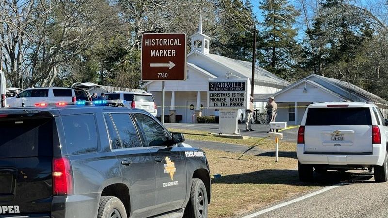 The Smith County Sheriff's Office investigates a fatal shooting incident at the Starville Methodist Church in Winona, Texas, on Sunday morning, Jan. 3, 2021. A suspect who fled has been arrested, said the sheriff’s office. (Zak Wellerman/Tyler Morning Telegraph via AP)