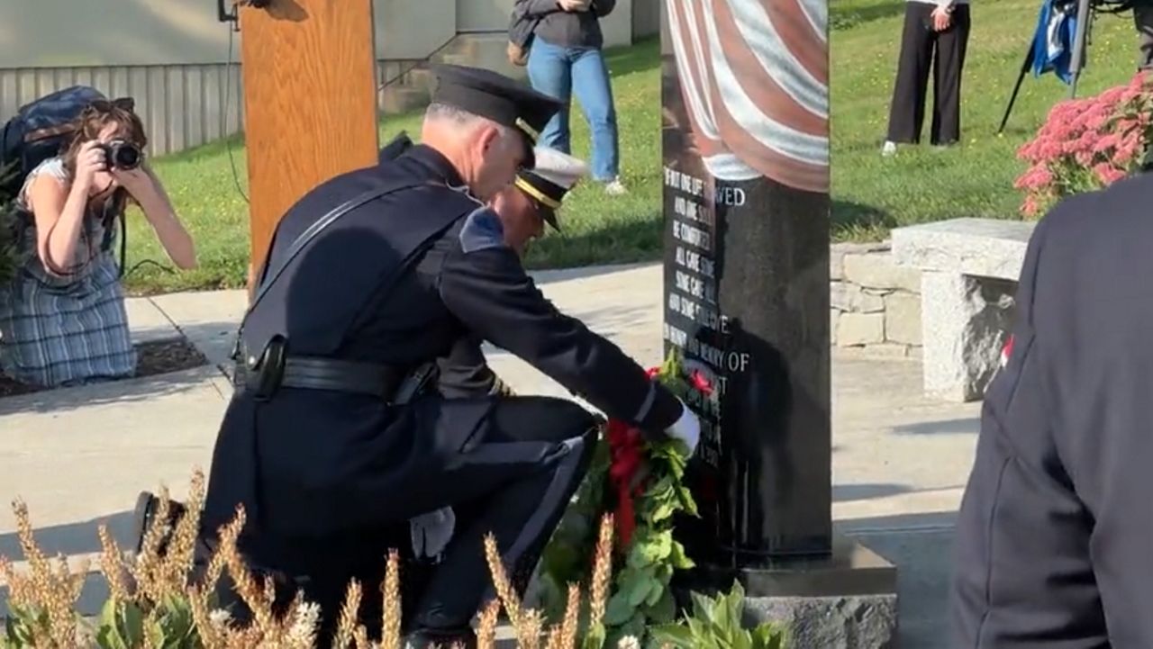 Wreaths are placed on Portland's 9/11 memorial on Wednesday, Sept. 11 (Spectrum News/Matthew Jaroncyk)