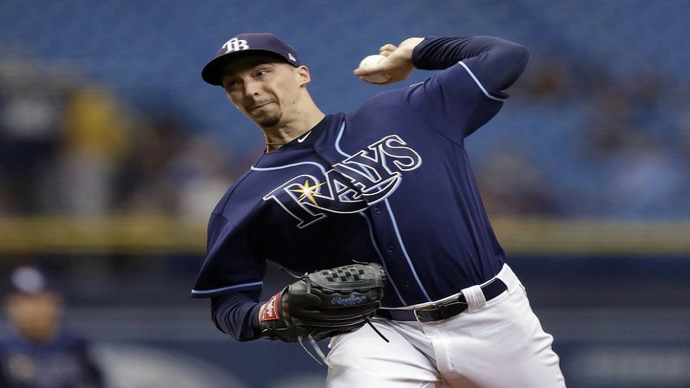 Rays left-handed pitcher Blake Snell pitches during the first inning of Tampa Bay's 3-1 win over Cleveland.  The 25-year old picked up his major-league leading 19th win.  (AP Photo/Chris O'Meara)