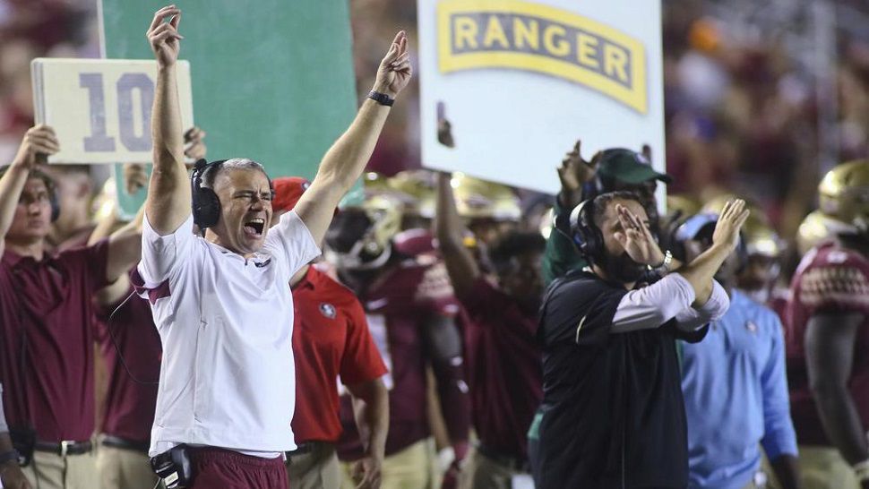 Florida State coach Mike Norvell gestures to the team as a play is called during the fourth quarter of Saturday's game against Jacksonville State which the Seminoles lost on a last-second touchdown. (AP Photo/Phil Sears)