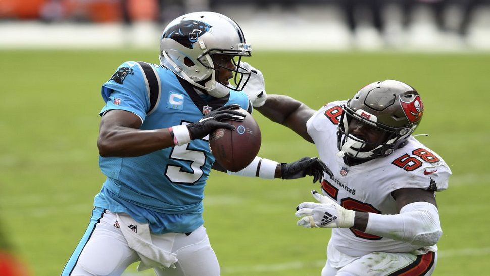 Tampa Bay OLB Shaq Barrett (58) chases down Carolina Panthers quarterback Teddy Bridgewater during the second half of the Bucs' 31-17 win over Carolina in Week 2.  (AP Photo/Jason Behnken)