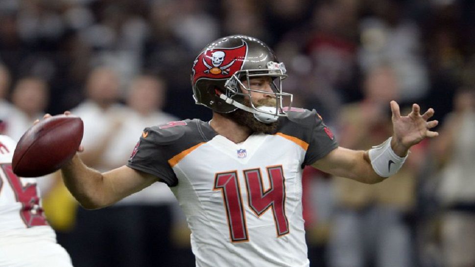 Tampa Bay Buccaneers QB Ryan Fitzpatrick throws for a career-high 417 yards in the 48-40 win over New Orleans. (AP Photo/Bill Feig)