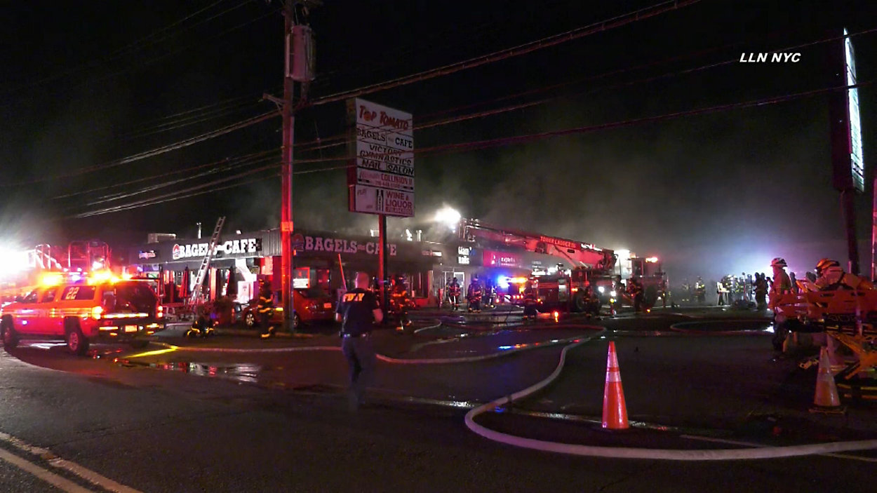 Firefighters battle a fire on Staten Island early Thursday morning. 