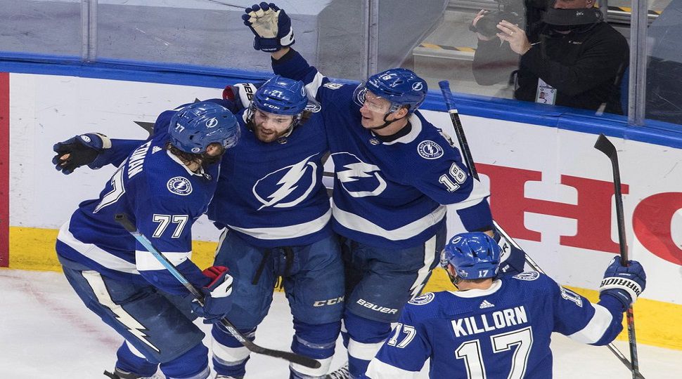 Tampa Bay Lightning center Brayden Point (21) celebrates his goal with  Ondrej Palat, right, as …