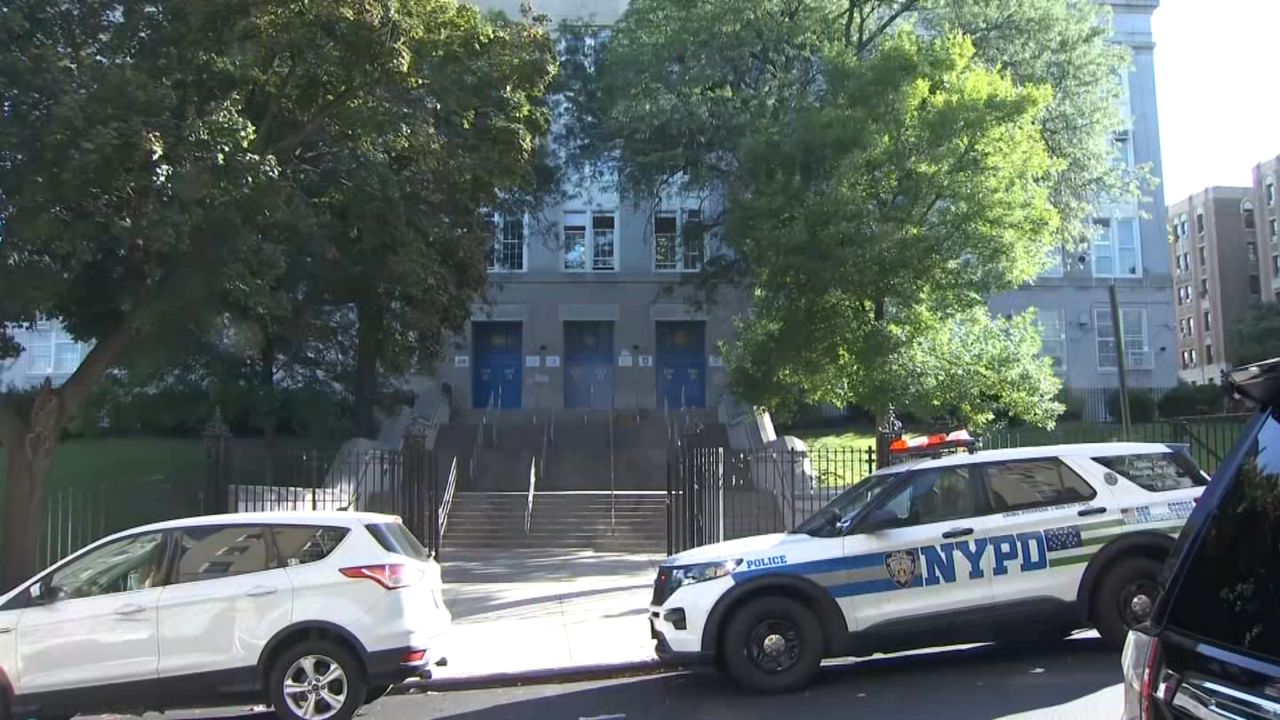Student stabbed, loaded guns found at city schools