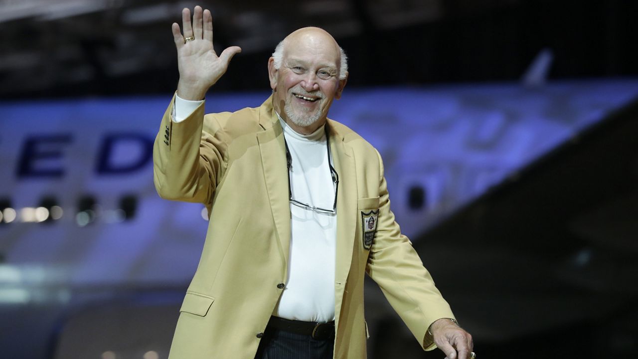 Billy Shaw is introduced before the inaugural Pro Football Hall of Fame Fan Fest Friday, May 2, 2014, at the International Exposition Center in Cleveland. (AP Photo/Mark Duncan)