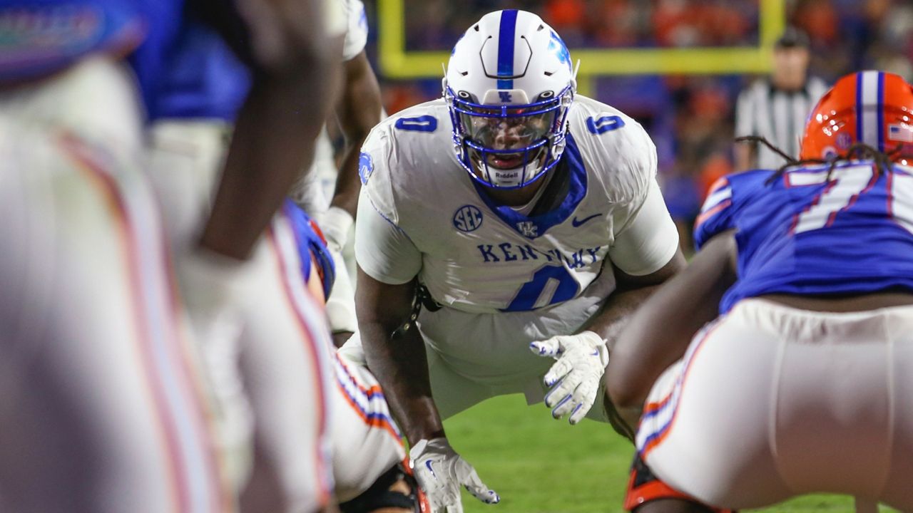 Kentucky defensive tackle Deone Walker (0) in action during an NCAA college football game against Florida, Saturday, Oct. 19 2024, in Gainesville, Fla. Florida defeated Kentucky 48-20. (AP Photo/Gary McCullough)